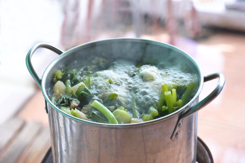 A boiling pot of vegetable soup