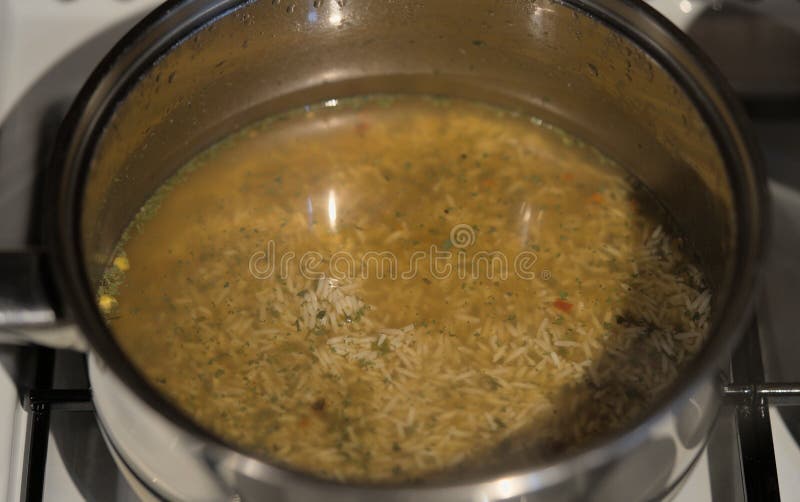 Boiling rice in pan stock image. Image of view, healthy 275095427
