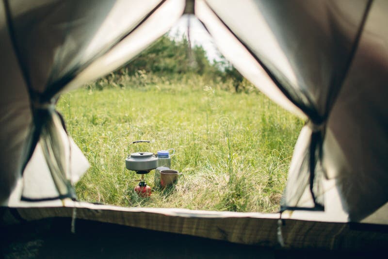 Boiling Water in Kettle on Portable Camping Stove Stock Photo Image