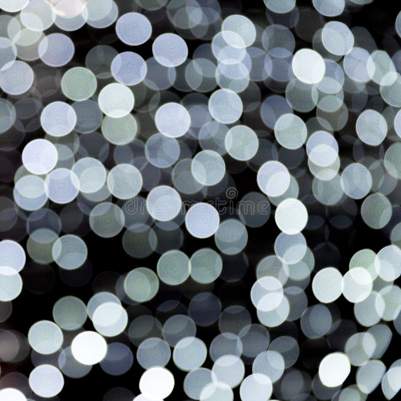 Bokeh abstrait des lumi?res blanches de ville sur le fond noir defocused et brouill? beaucoup autour de la lumi?re images libres de droits Bokeh abstrait des lumi?res blanches de ville sur le fond noir defocused et brouill? beaucoup autour de la lumi?re images libres de droits