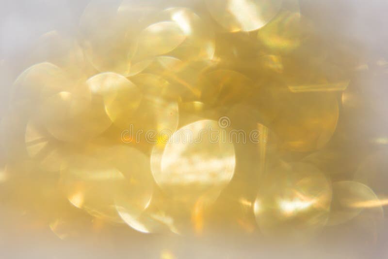 Abstract background gold bokeh circles for use background royalty free stock image