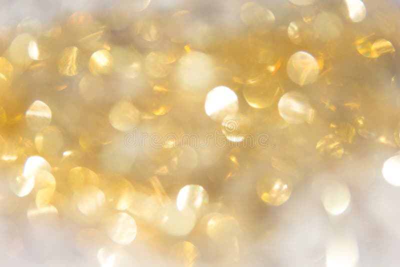 Abstract background gold bokeh circles for use background royalty free stock photography