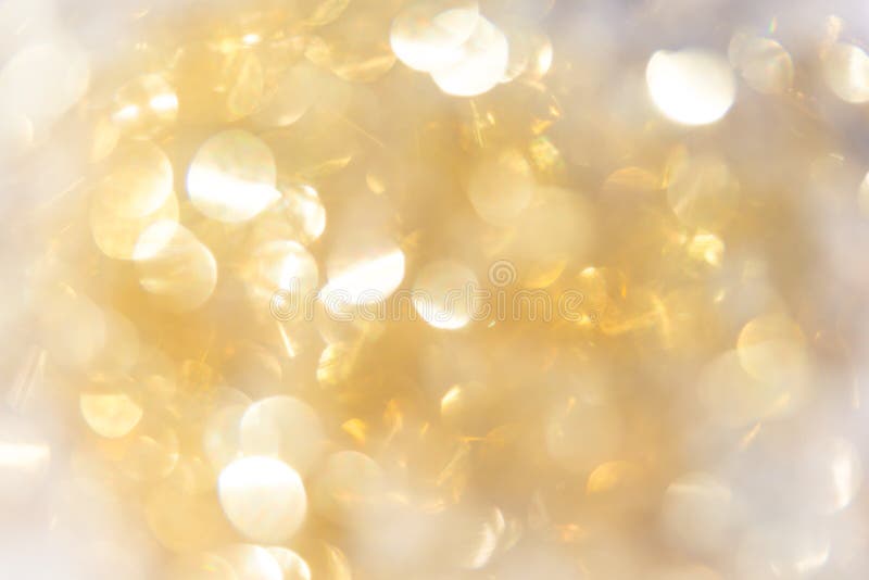 Abstract background gold bokeh circles for use background royalty free stock images
