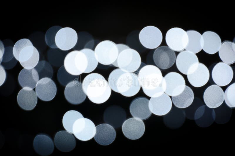 Bokeh borrou o fundo abstrato, luz defocused de luzes obscuras imagem de stock royalty free Bokeh borrou o fundo abstrato, luz defocused de luzes obscuras imagem de stock royalty free