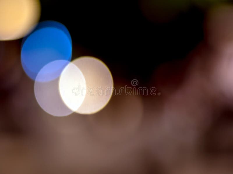 Bokeh de la iluminación en fondo de la noche fotografía de archivo Bokeh de la iluminación en fondo de la noche fotografía de archivo