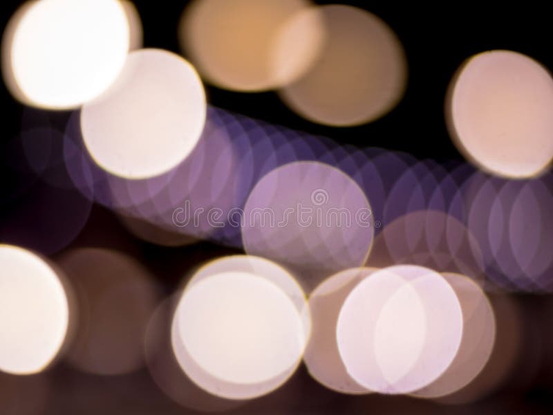 Bokeh de la iluminación en noche fotografía de archivo Bokeh de la iluminación en noche fotografía de archivo