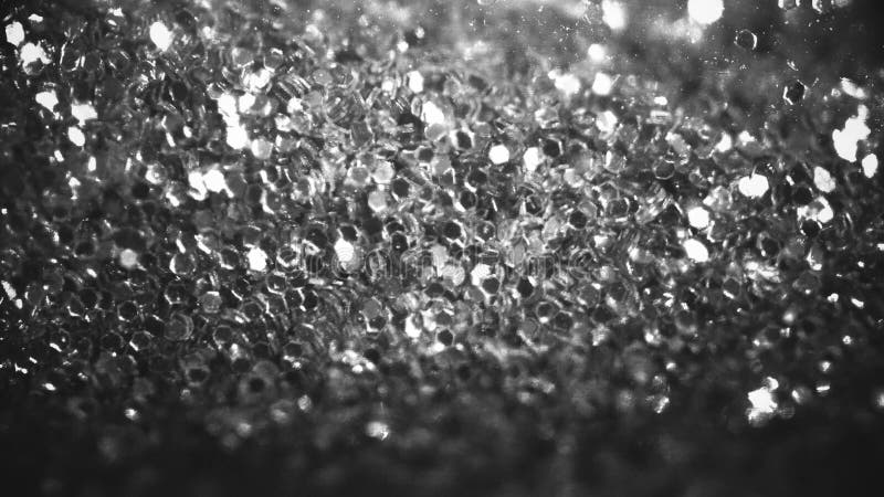 Bokeh lights sparkle, abstract shining background black and white texture, bright, cold frozen ice photo