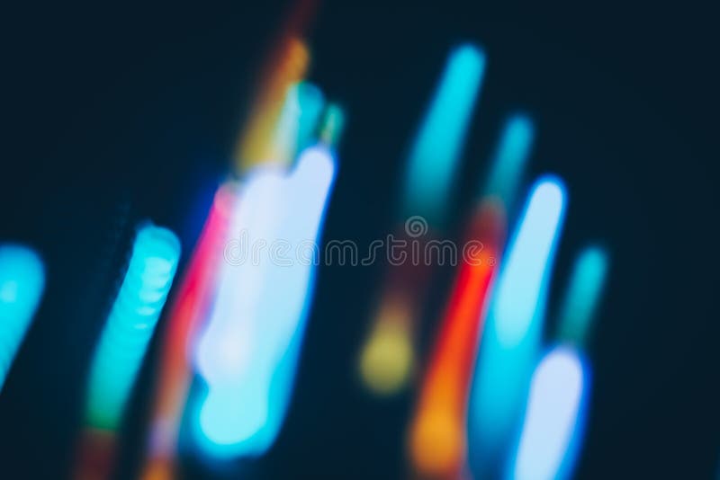Bokeh mágico de la Navidad de las luces en fondo negro foto de archivo libre de regalías Bokeh mágico de la Navidad de las luces en fondo negro foto de archivo libre de regalías