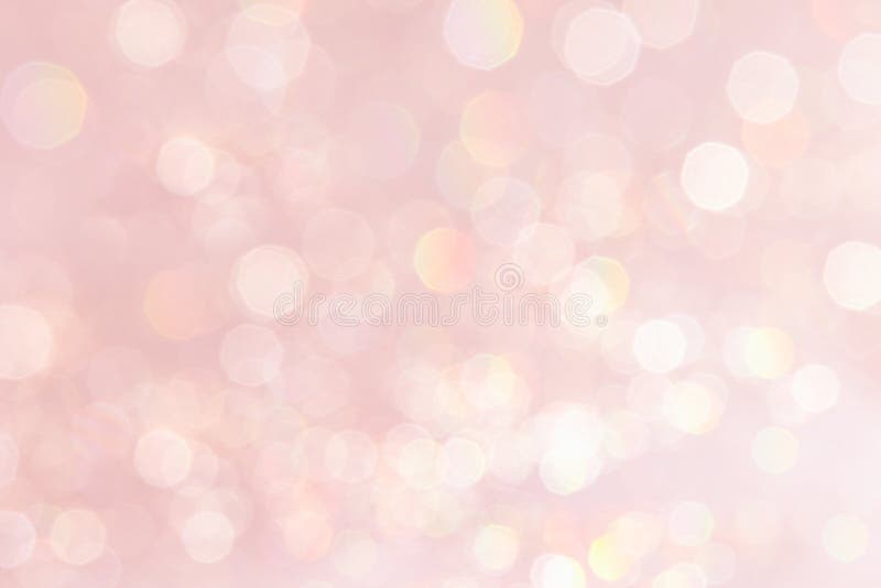 Fond roz pastel moale, cu lumini aurii neclare. stock photography