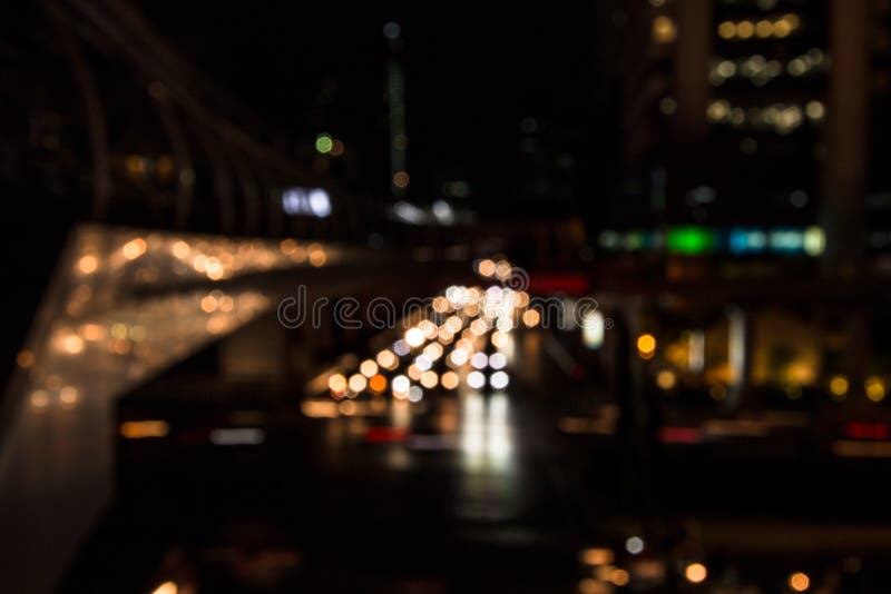 Bokeh urbano abstracto de la luz de la noche de la ciudad, fondo defocused fotos de archivo libres de regalías Bokeh urbano abstracto de la luz de la noche de la ciudad, fondo defocused fotos de archivo libres de regalías
