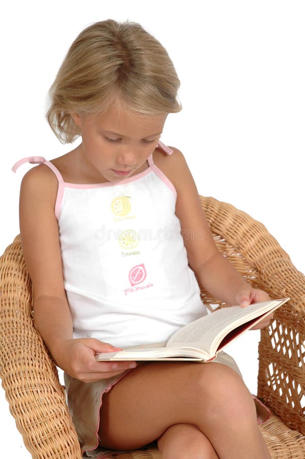 Read: to look at carefully so as to understand the meaning of. Child reading a book in a chair isolated on white background. Reading broadens the mind. Read: to look at carefully so as to understand the meaning of. Child reading a book in a chair isolated on white background. Reading broadens the mind.