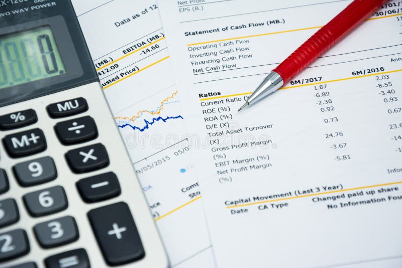 Financial statement read and check the number for analysis with red pen. Financial statement read and check the number for analysis with red pen