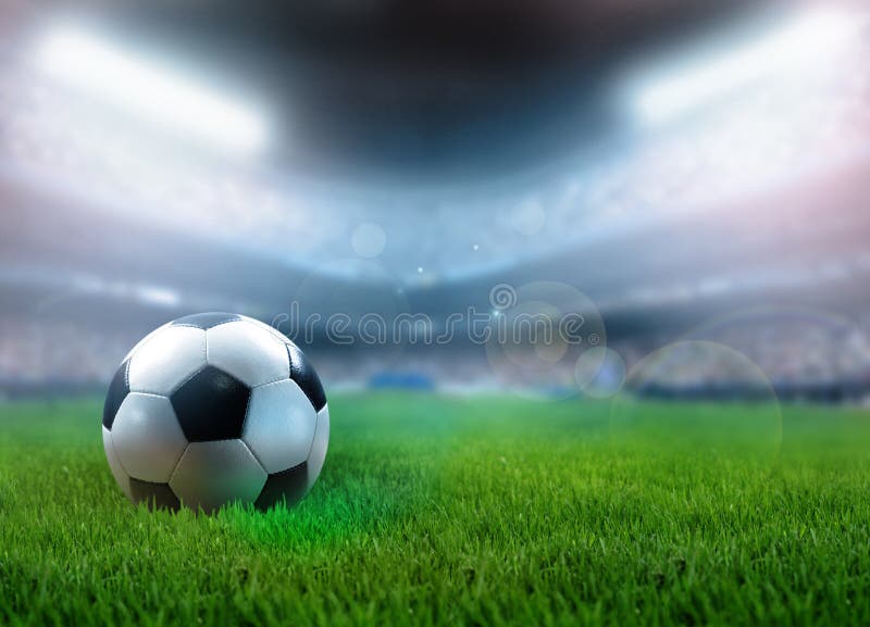 Bola de futebol na grama ilustração stock Bola de futebol na grama ilustração stock