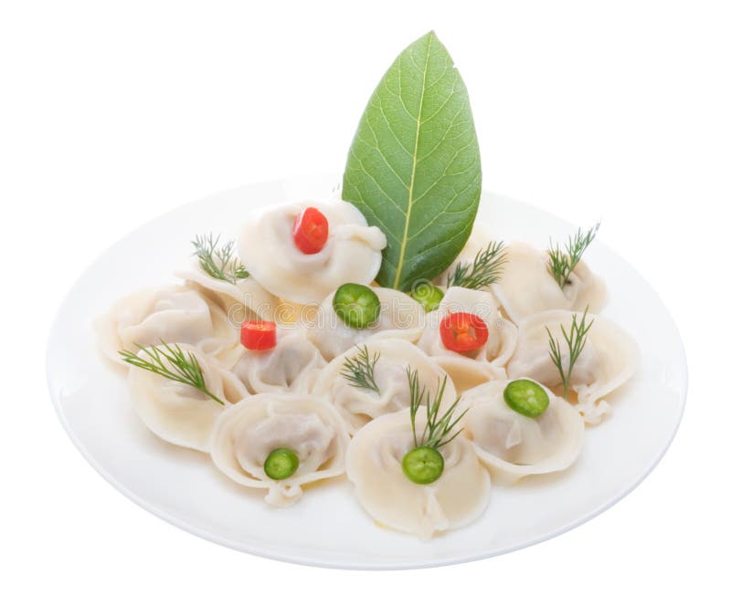 Russian meat dumplings aka pelmeni on the white plate isolated on the white background. Russian meat dumplings aka pelmeni on the white plate isolated on the white background