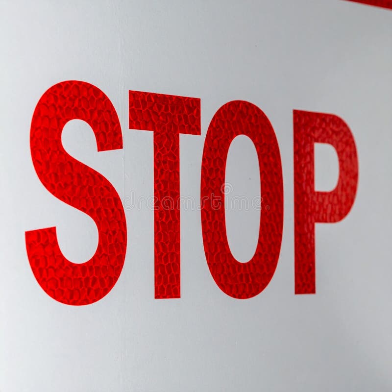 Bold Red Stop Warning on White Background royalty free stock photos