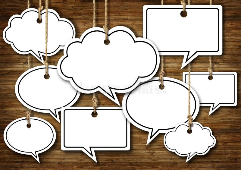 Speech Bubbles Hanging on Wooden Background. Speech Bubbles Hanging on Wooden Background