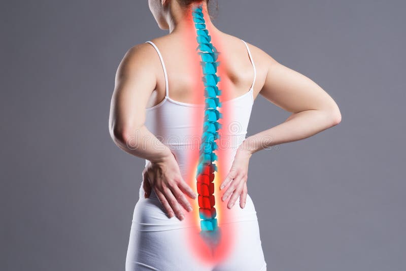 Pain in the spine, woman with backache on gray background, back injury, photo with highlighted skeleton. Pain in the spine, woman with backache on gray background, back injury, photo with highlighted skeleton