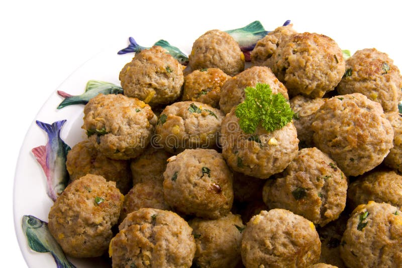 Tasty fish balls on a plate isolated over white. Tasty fish balls on a plate isolated over white