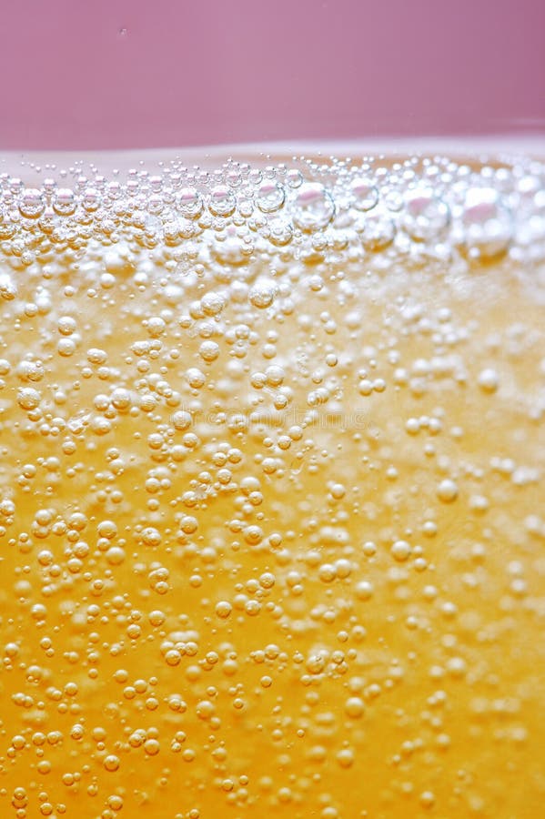 Bollicine di champagne dorate fotografia stock libera da diritti