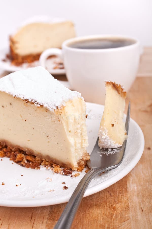 Cheesecake clássico e café imagens de stock royalty free