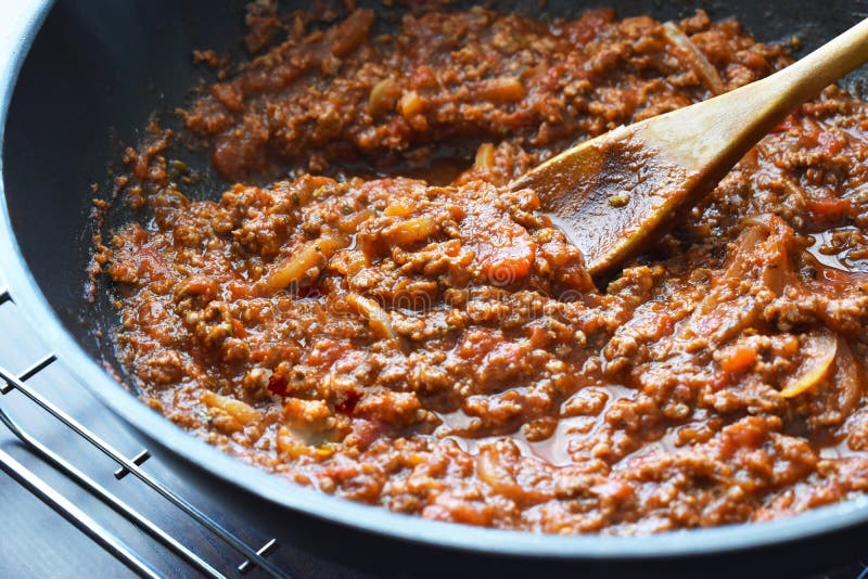 Bolognese sauce in a wok. stock photo. Image of culinary - 246960946