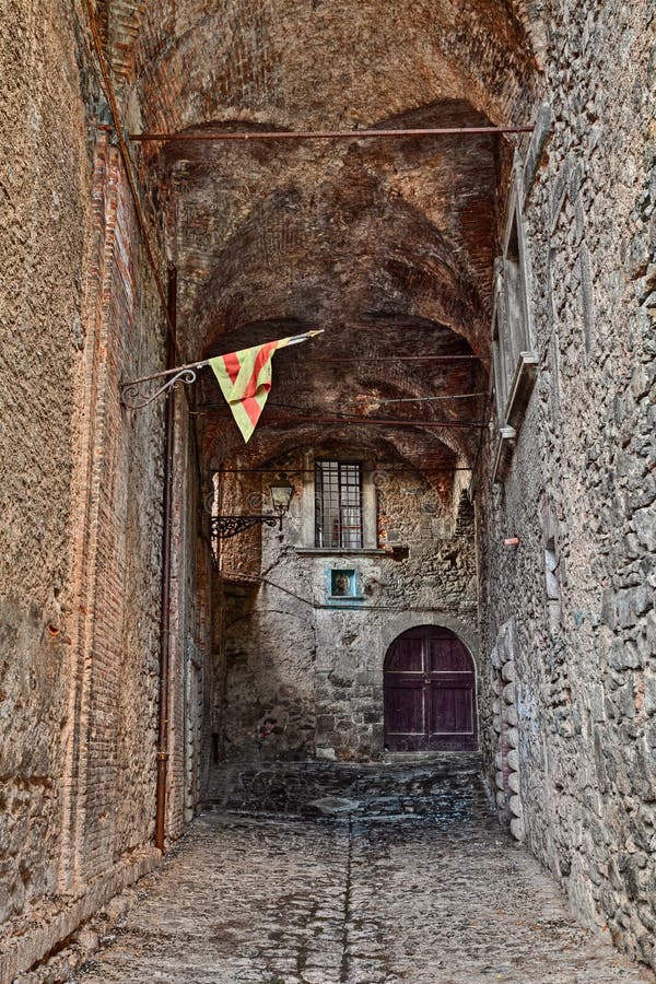 Bolsena, Viterbo, Lazio, Italy: ancient covered alley in the old town royalty free stock image Bolsena, Viterbo, Lazio, Italy: ancient covered alley in the old town royalty free stock image