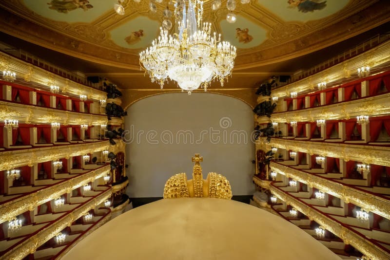 MOSCOW,RUSSIA-Augus t 09: The Bolshoi Theatre a historic theatre of ballet and opera in Moscow, Russia,the interior auditorium by architect Alberto Cavos in 1895. on August 09,2013 in Moscow,Russia. MOSCOW,RUSSIA-Augus t 09: The Bolshoi Theatre a historic theatre of ballet and opera in Moscow, Russia,the interior auditorium by architect Alberto Cavos in 1895. on August 09,2013 in Moscow,Russia