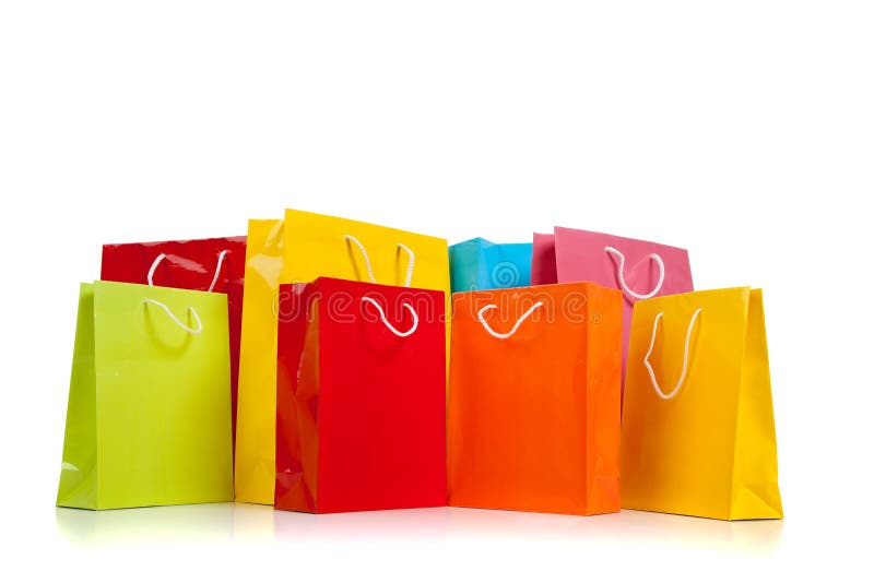 Bolsos de compras coloreados clasificados en blanco imagenes de archivo Bolsos de compras coloreados clasificados en blanco imagenes de archivo