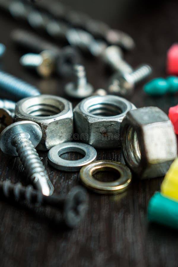 Bolts and Screws on a Wooden Table Stock Photo Image of nuts