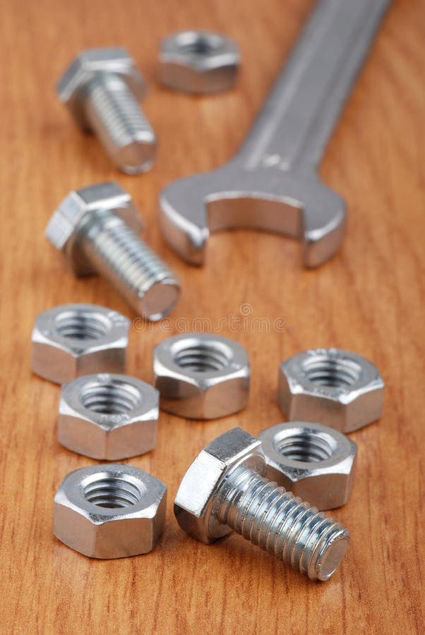 Bolts and wrench stock photo. Image of tool, equipment 27126280