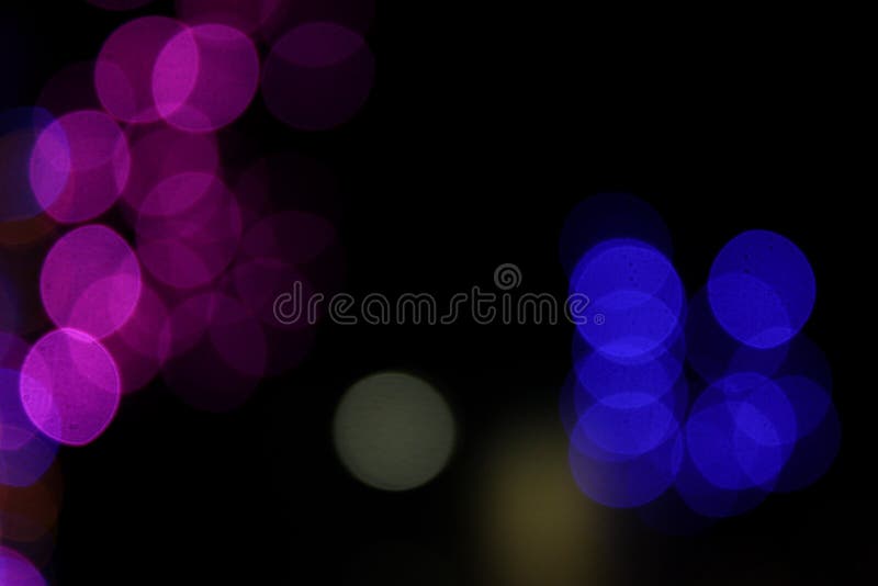 Bombillas llevadas coloridas en efecto del bokeh en fondo negro efecto luminoso borroso foto de archivo libre de regalías Bombillas llevadas coloridas en efecto del bokeh en fondo negro efecto luminoso borroso foto de archivo libre de regalías