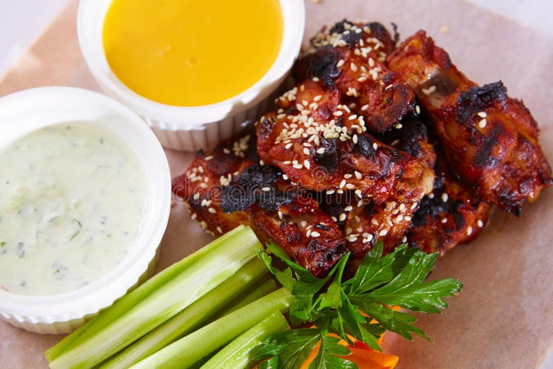 Boneless Buffalo Bbq Chicken Wngs with Ranch Sauce Stock Photo Image of carrot, orange 195006888