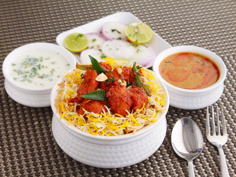 Hyderabad Deccan rice dish made of meat, vegetables with slow cooking process dum availble in lot of varieties like chicken, mutton, vegetarian, prawn, mushroom, paneer. Chicken dum biryani stock images, royalty-free photos and pictures