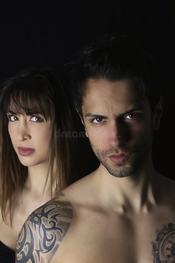 Book cover design. beautiful woman and an handsome man on black background royalty free stock photo Book cover design. beautiful woman and an handsome man on black background royalty free stock photo