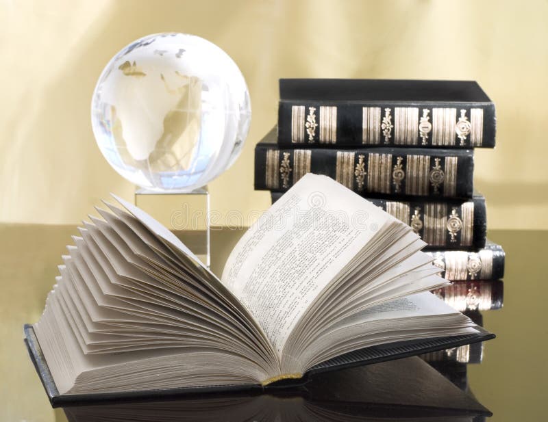 Book with globe still life ( reading series) royalty free stock images