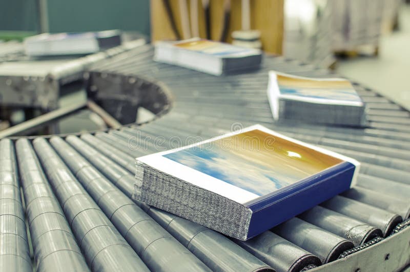 Book, magazine, production line into press plant house royalty free stock photo