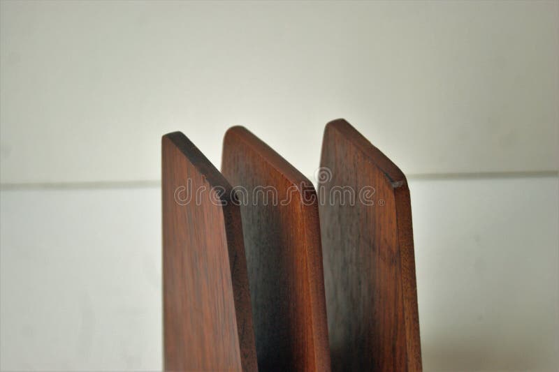 Bookends in teak and rosewood.