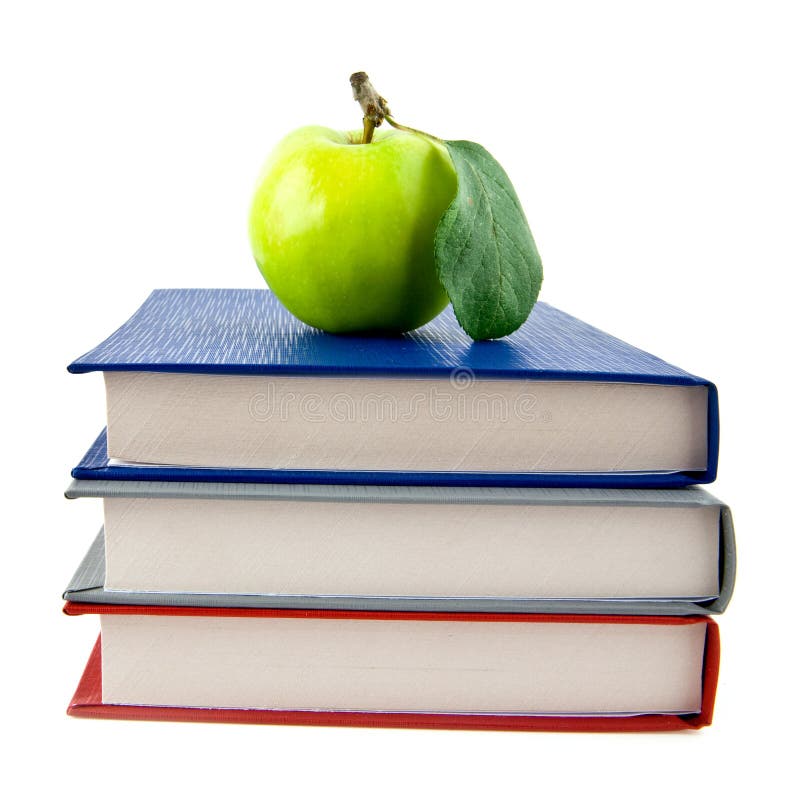 Books and apple on a table stock photo. Image of education 8703396