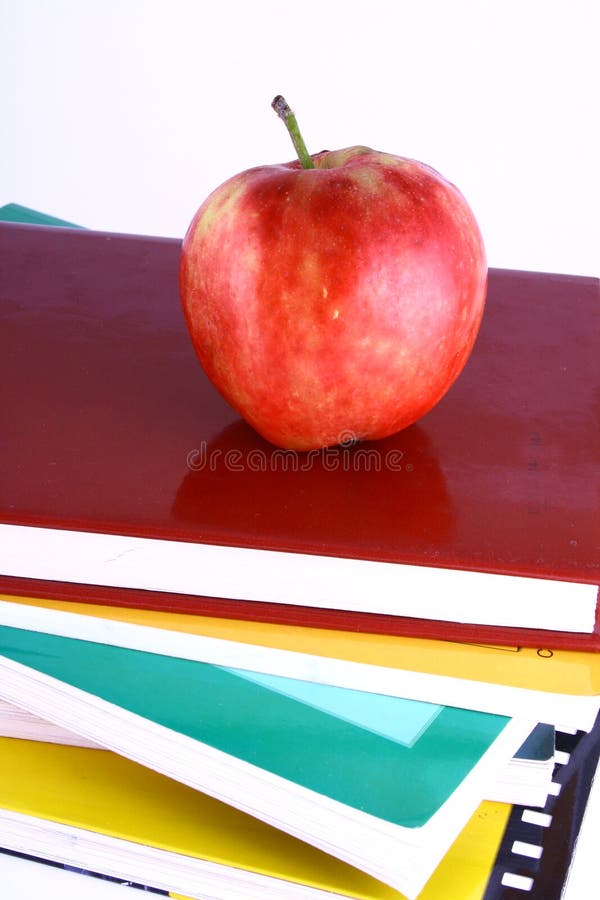 Books and apple