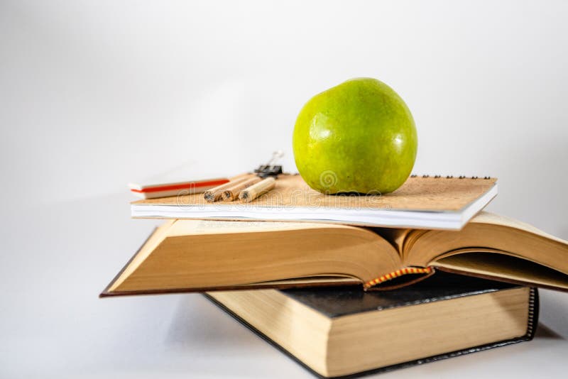 Apple And Books On White Background Stock Image Image of closeup, research 24259629