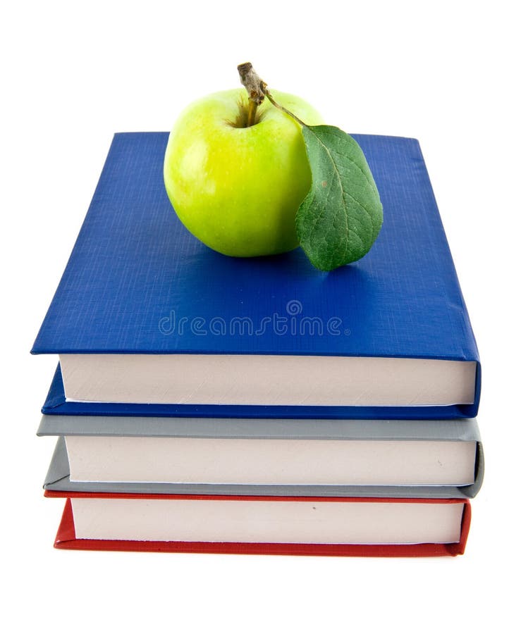 Books and apple on a table stock photo. Image of education 8703396