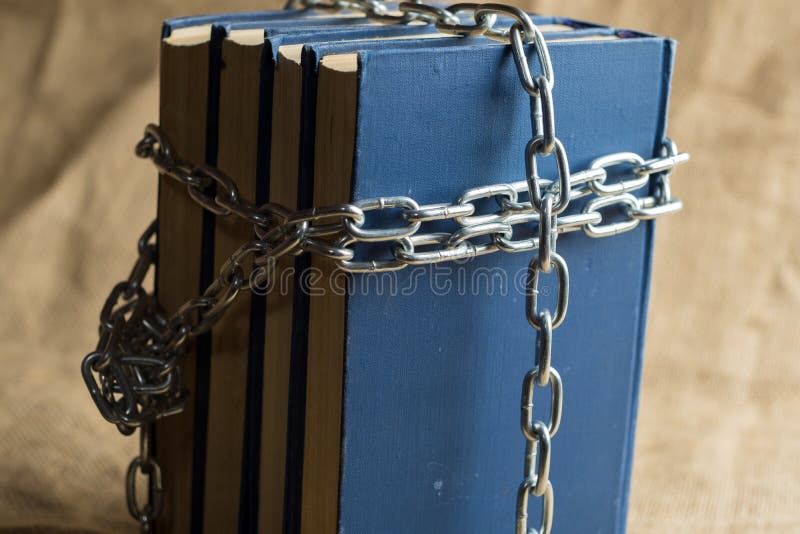 Books in Blue Binding are Covered with a Chain of Metal, a Chain in the