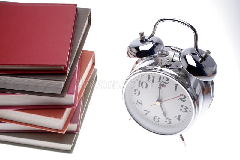 Books & clock royalty free stock photos