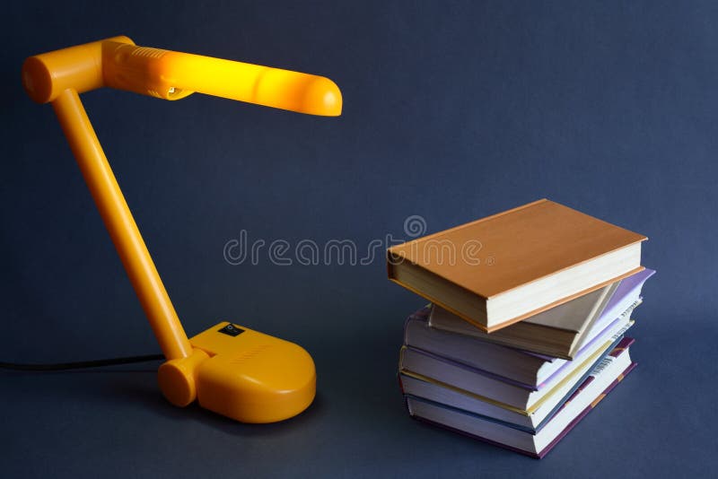 Books And Desk Lamp