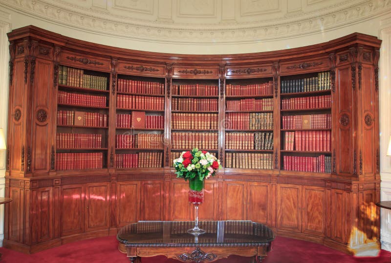 Books in Library in the Ã‰lysÃ©e Palace the portrait of French president taken in this room