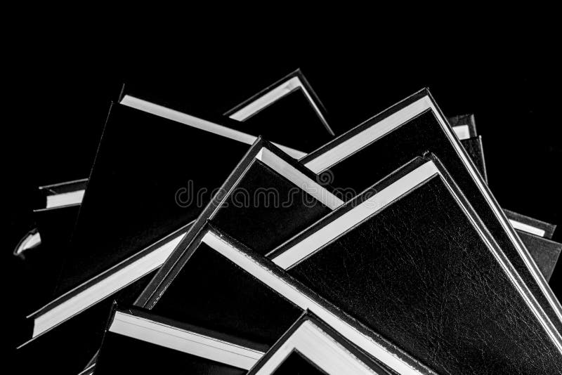 Books Piled on Top of Each Other, Black and White Photography. Stock