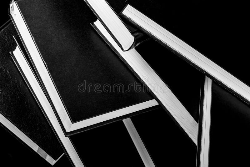 Books Piled on Top of Each Other, Black and White Photography. Stock