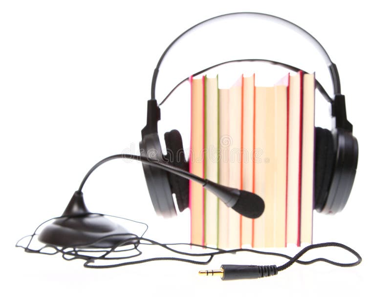 Books stack and headset with a microphone isolated