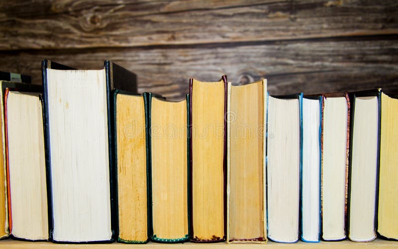 Books Standing on the Shelf Stock Photo Image of learning, education