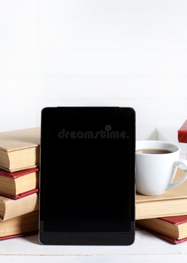 Books with tablet stock photo. Image of learn, stack 66360430